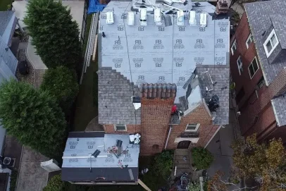 Aerial view of house roof under construction.