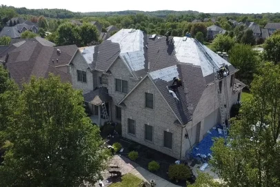 House with ongoing roof replacement and repair.