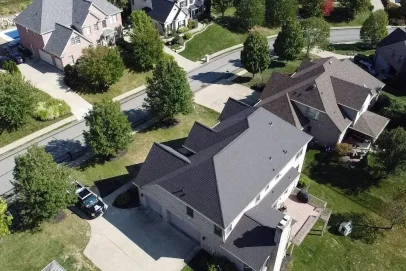 Aerial view of suburban neighborhood with houses.